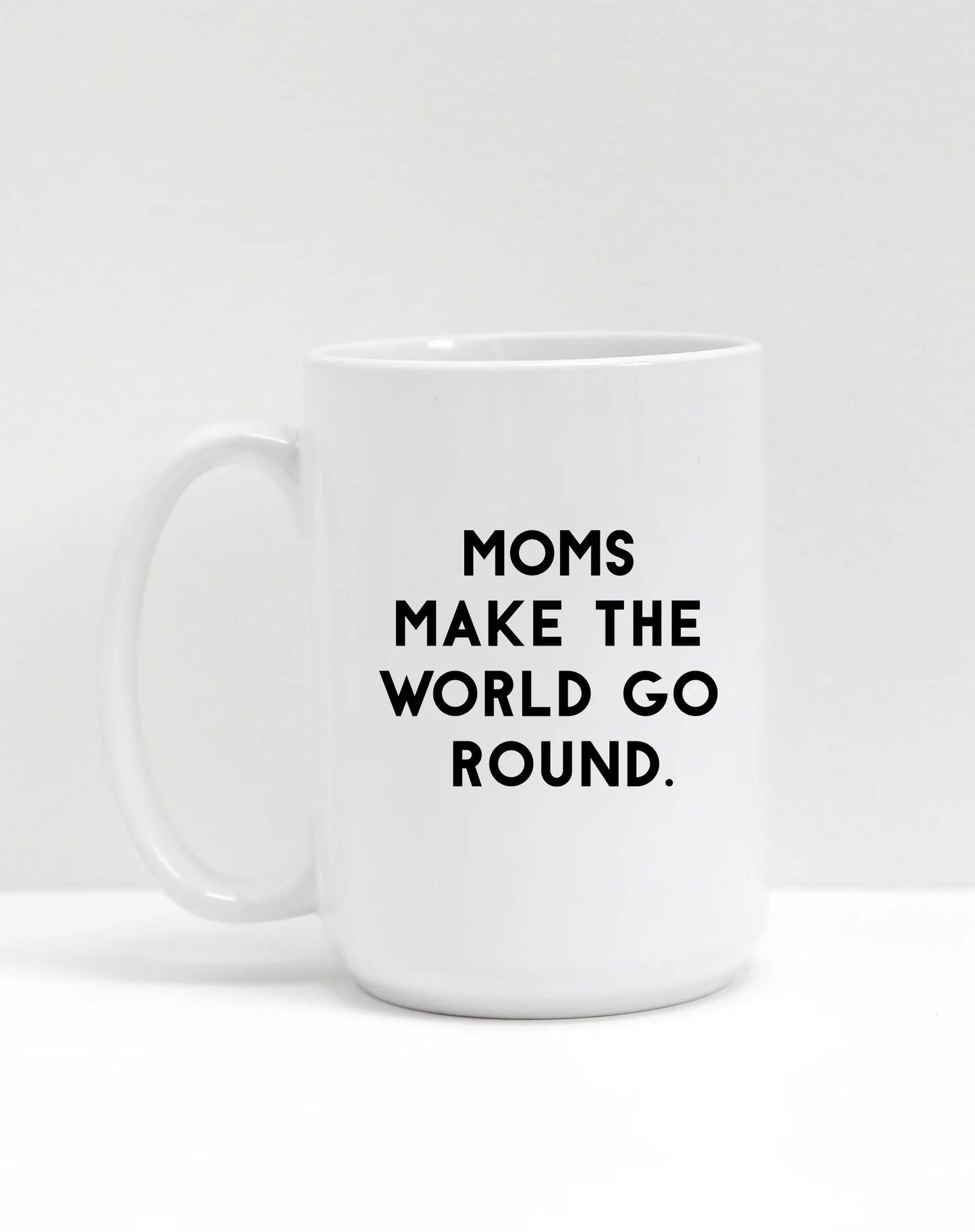 The "MOMS MAKE THE WORLD GO ROUND" Mug Brunette the Label